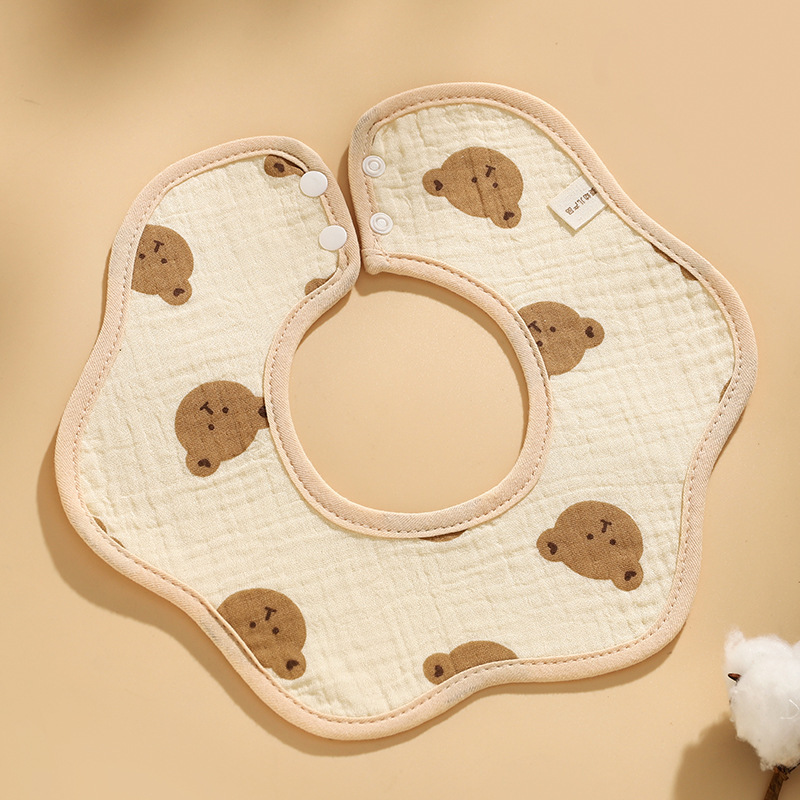Tête d'ours (bavoir imperméable pétale)