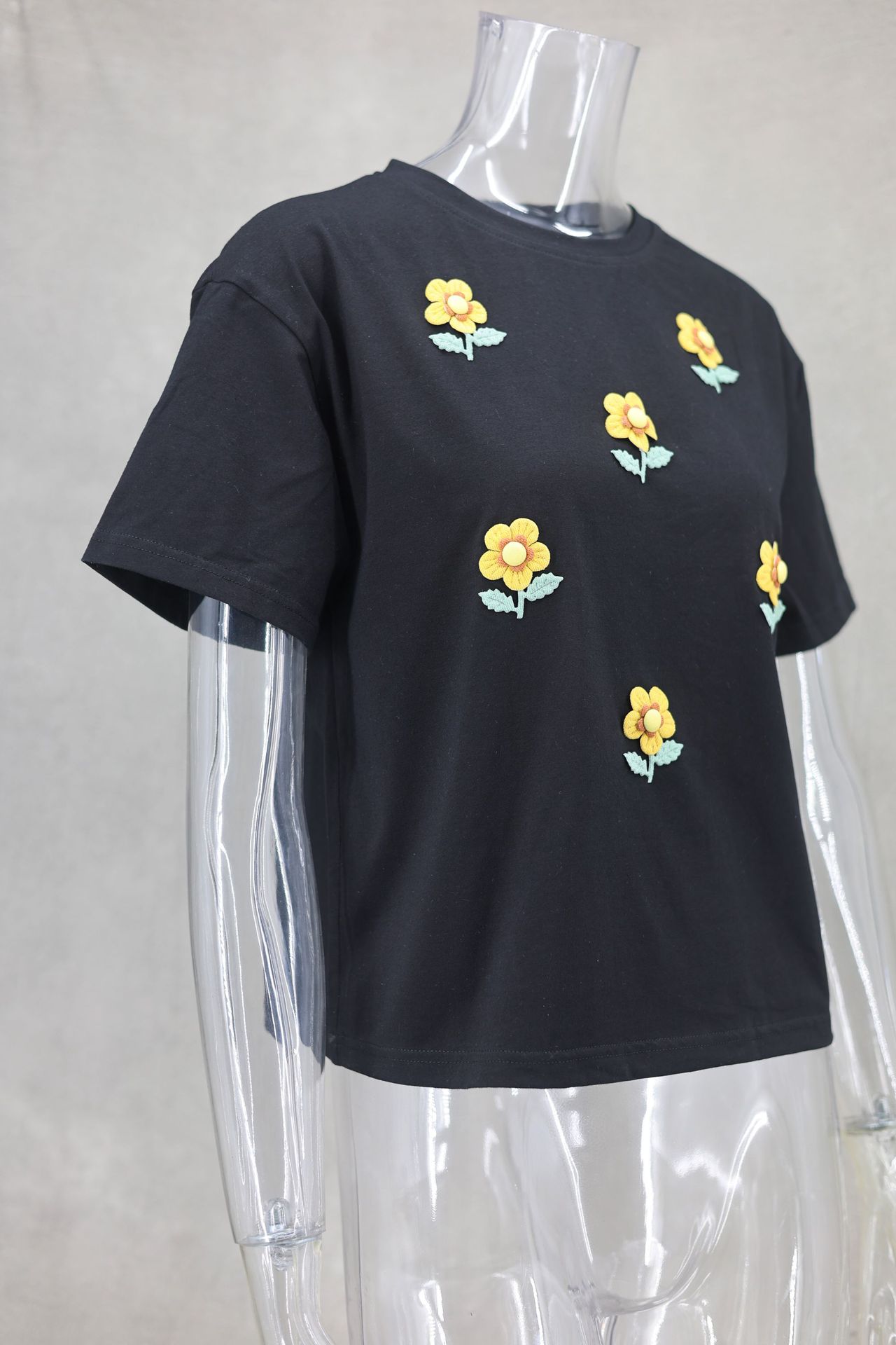 140g Weight Short Sleeve Sleeve Length Pullovers Placket Type Regular Sleeve Sleeve Type Polyester Fabric Type Regular Top Length T-shirt Tops Type Daily Occasion Round Neck Neckline Loose Fit Type Flower Pattern Summer Season Women's Gender Casual Style Wholesale Women's Casual Flower Short Sleeve T-Shirts 15
