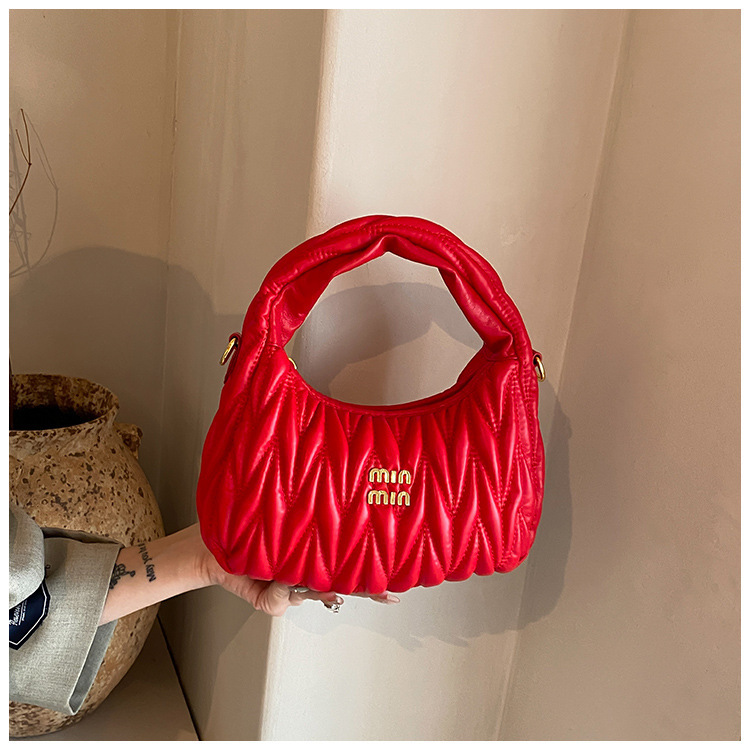 Bolsos de todo fósforo 2024 moda de verano textura plisada bolsa de axilas bolso retro ins bolso femenino de moda simple