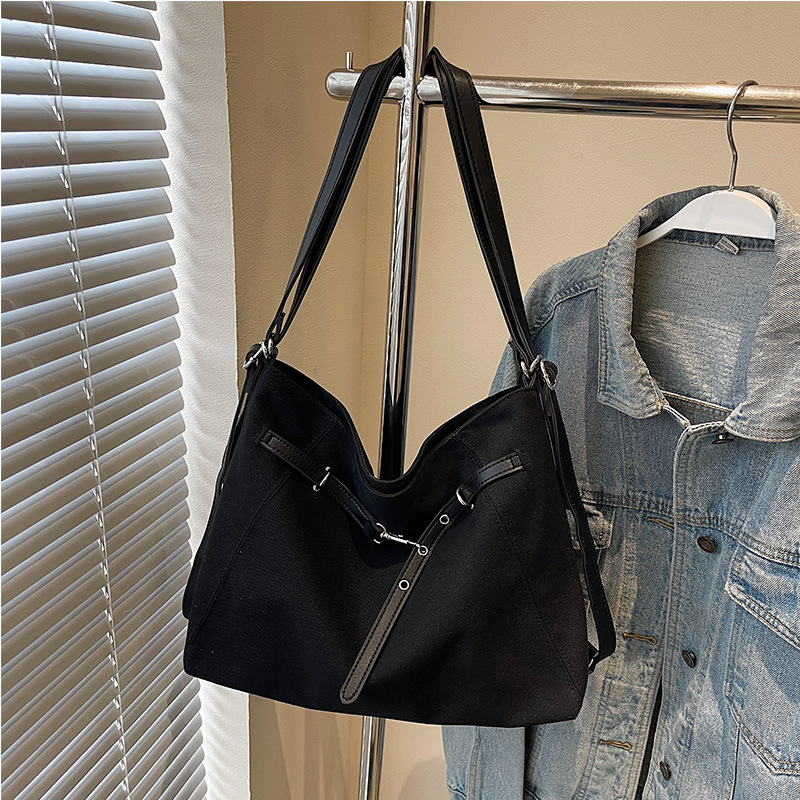 Bolsa de hombro de denim para mujeres 2025 primavera retro alta sensación bolso de hombro de gran capacidad tote bag de viaje
