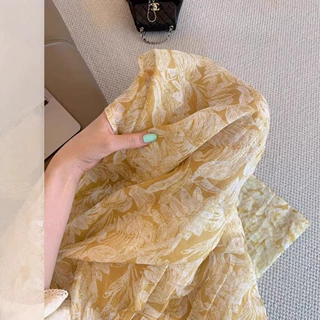 法式复古风黄色亚麻印花高腰半身裙夏季气质高级感薄款直筒a字裙