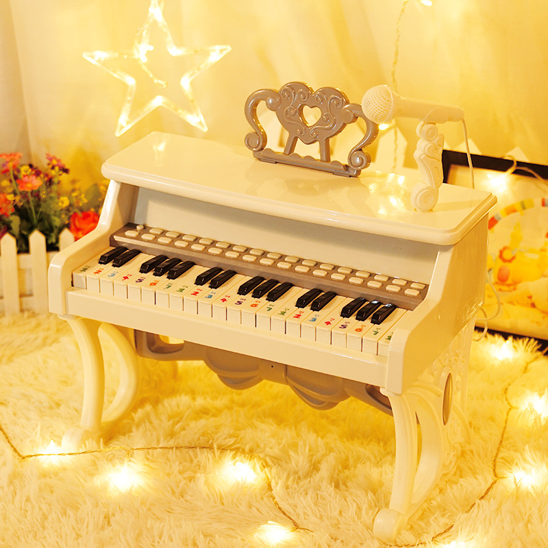 Mini piano toy with microphone, imitation piano keys, electronic keyboard, suitable for girls aged 1-3-5 years old, multi-functional music education.
