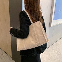 工厂批发2025新款女包韩版车缝线文艺百搭时尚手提帆布包女公文包