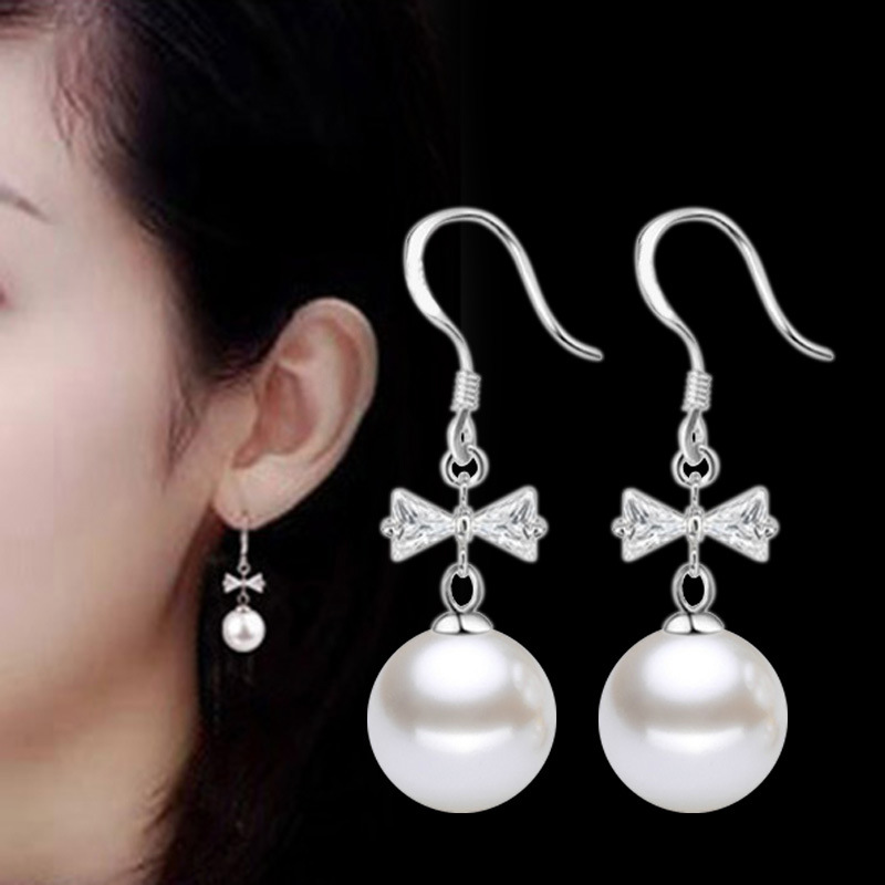 Cross-Border fashion Korean version of silver-plated women bow tassel long pearl earrings women's ear jewelry wholesale