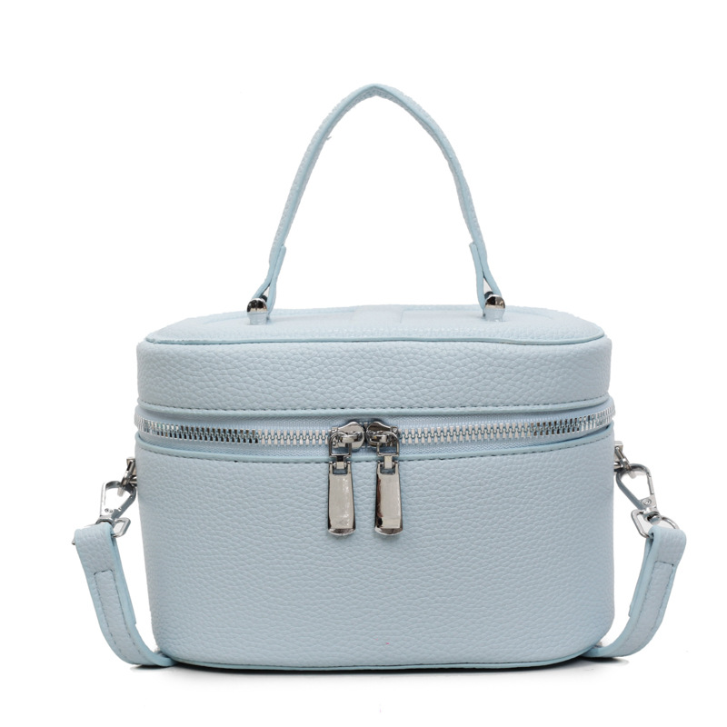 Bolso de cubo popular de este año 2025 verano nuevo bolso de hombro con patrón de lichi bolso de mensajero simple y versátil mujer