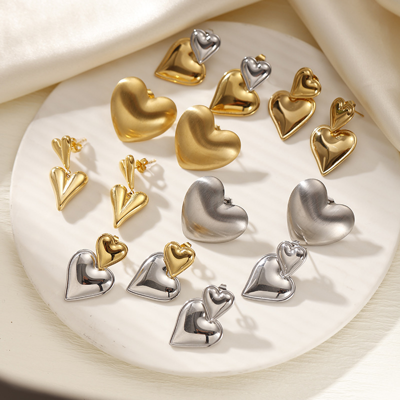Taina Omeiins amor de moda alta sensación de textura bicolor pendientes de acero inoxidable 18k oro titanio pendientes de acero para mujeres