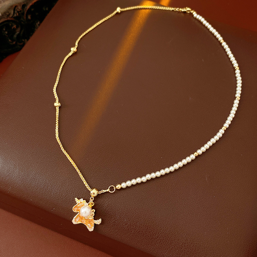 Oro verdadero eléctrico galvanis colgante de piedra pony pendientes collar ligero lujo nicho universal conjunto temperamento alta sensación de joyería mujer