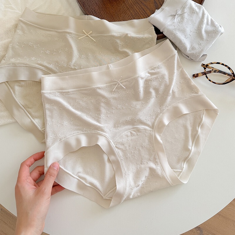 Wenxin'er jacquard comfortable breathable seamless mid-waist women's bowknot triangle panties Wenxin'er jacquard comfortable breathable seamless mid-waist women's bowknot triangle panties