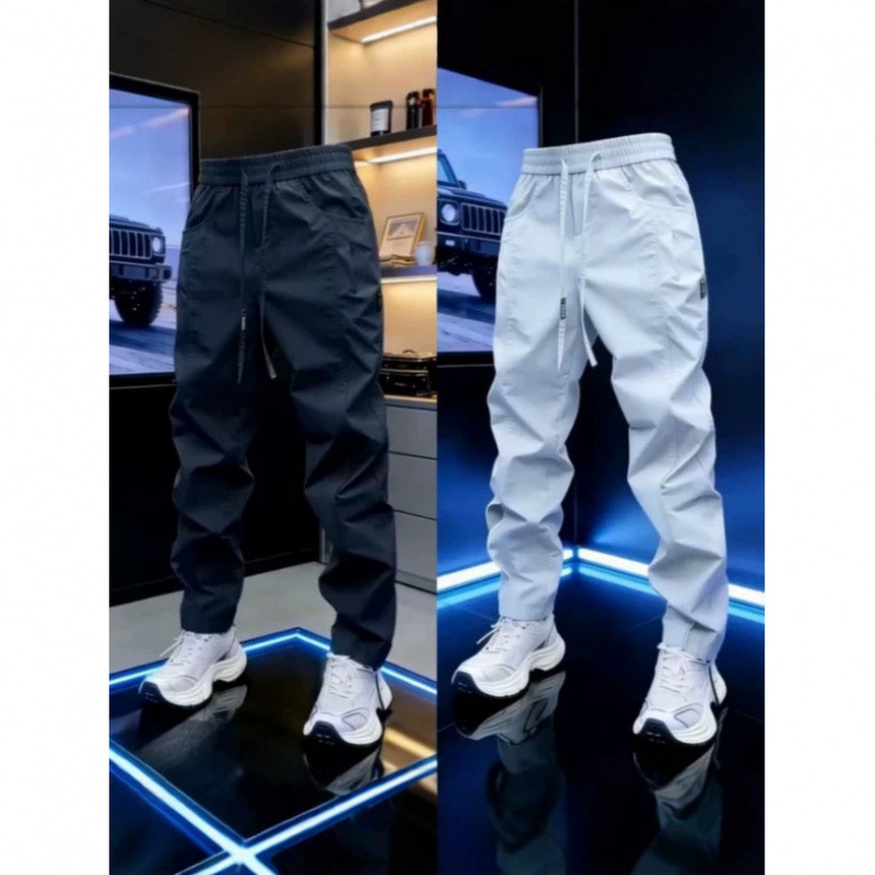 High-end 2026 Spring/Summer men's sporty windproof pants, fashionable outdoor style, comfortable, loose fit, stretchy, slimming, casual pants.