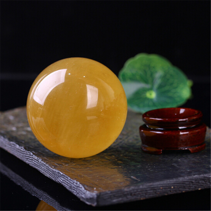 Factory Supply Raw Stone Polished Natural Yellow Crystal Ball Ornaments Calcite Ice Continent Stone Decorative Decoration Furnishings Wholesale