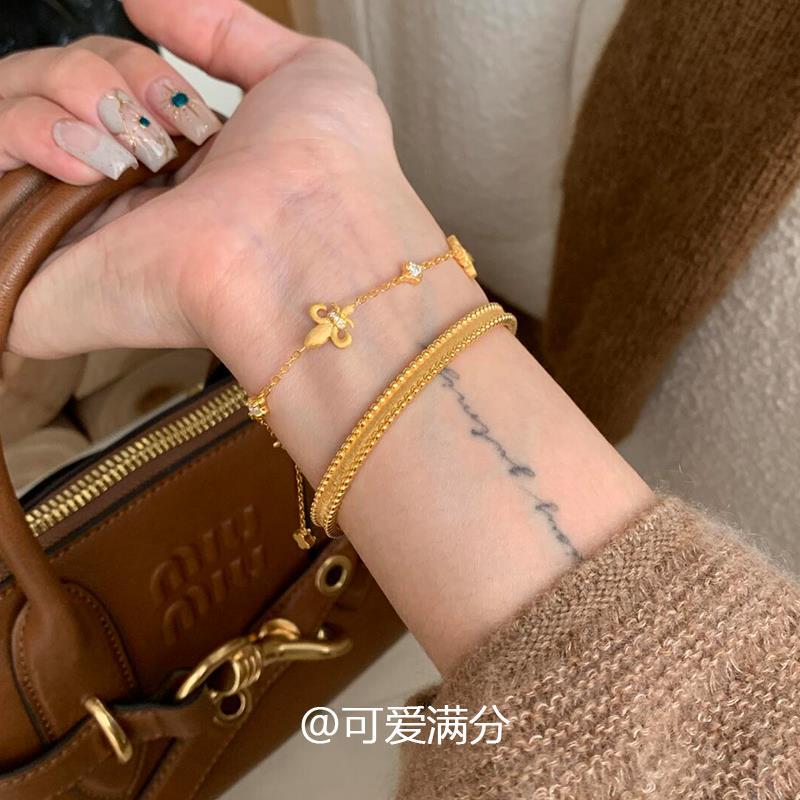 「金玉良縁」中古の金色のアイリスのブレスレットの高い顔の値は少しジルコンを入れてプレゼントします。|undefined
