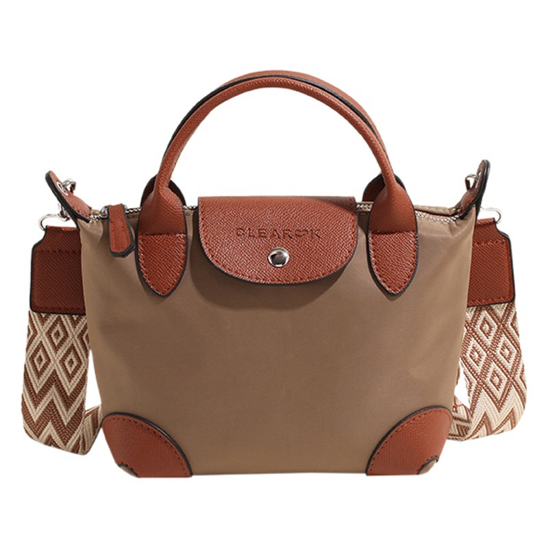Mini bolso de bolsillo de mano pequeña mujer 2025 nuevo estilo transfronterizo de tela de nylon ligera de moda ocio de hombro bolsa inclinada