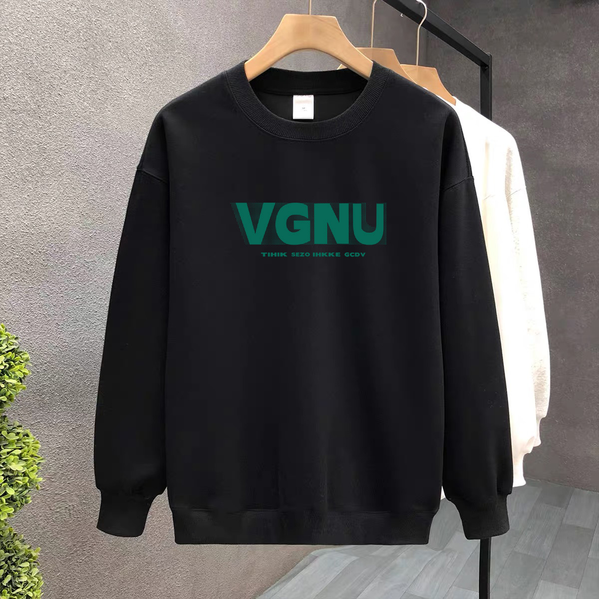 Suéter de algodón negro pesado de alta gama para mujeres 2025 otoño y invierno nuevo estilo europeo y americano camiseta de manga larga fondo suéter de estudiante