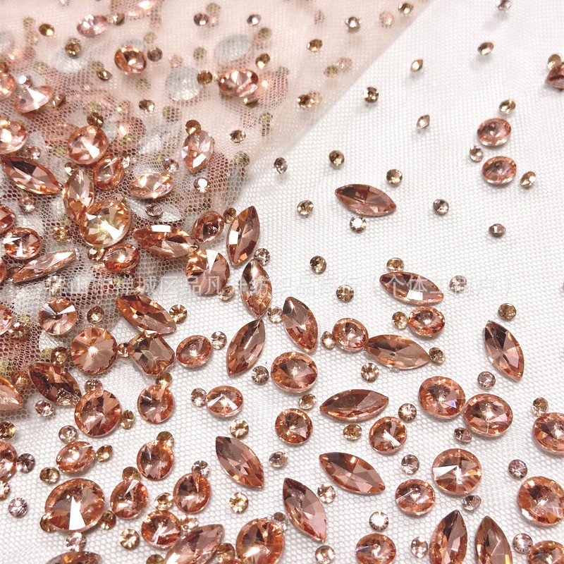 Tejido de malla de perforación caliente de mano pesada al por mayor comercio exterior transfronterizo ropa de moda de lujo tela de vestido