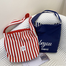 帆布条纹包包女2024新款夏季大容量通勤包百搭一根带单肩包