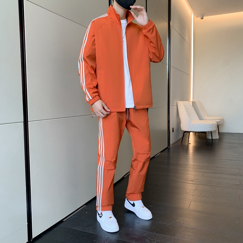 Primavera y otoño transfronterizos chaqueta delgada ropa deportiva hombre ocio tres barras juego de deporte de correr al aire libre dos piezas juego de comercio exterior