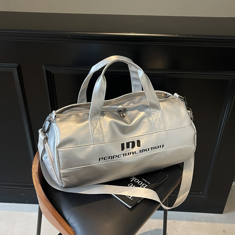 Bolsa de ejercicios mayorista de gran capacidad de separación seca y húmeda bolso deportivo de tendencia de cuero suave sensación mochila bolsa de viaje de embarque
