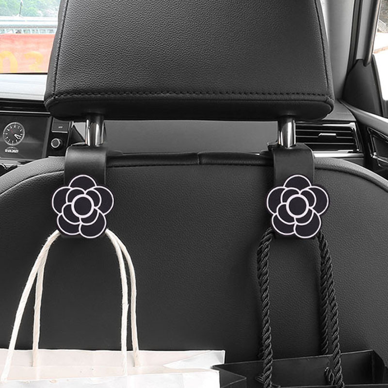 Meiyesi suministros de decoración de automóviles silla trasera gancho de coche celebridad de Internet hermoso gancho de dibujos animados almacenamiento de camelia