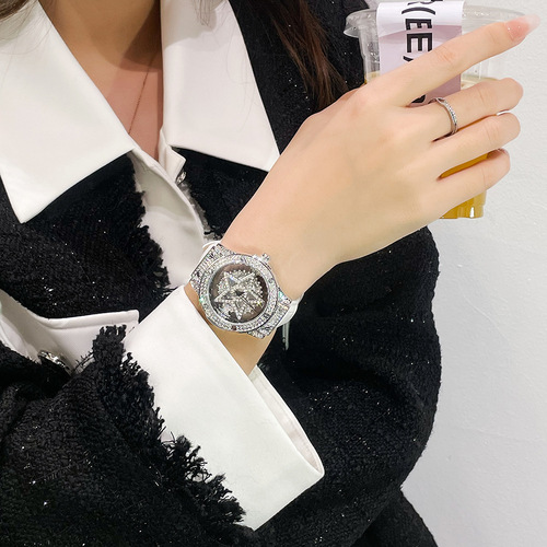  new women's watch DIMINI hollow transparent rotating rhinestone light luxury five-pointed star watch for women