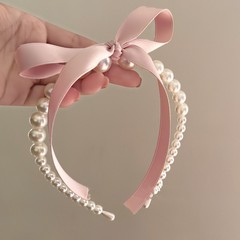 Creamy, girly vibes—elegant French-style pink bow ribbon with pearl accents, perfect for a sweet, sophisticated, and charming hair accessory or headband.