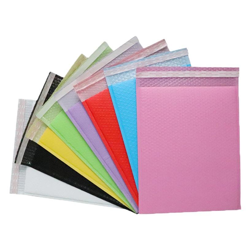 Bolsa de burbuja de película coextruida de color bolsa de embalaje expreso de espuma engrosada ropa de embalaje autoadhesiva sobre bolsa de burbuja al por mayor