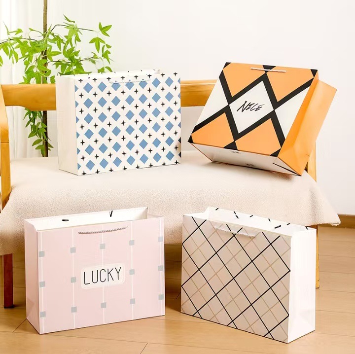 新款超级一号厂家直销精美礼品包装袋手提袋