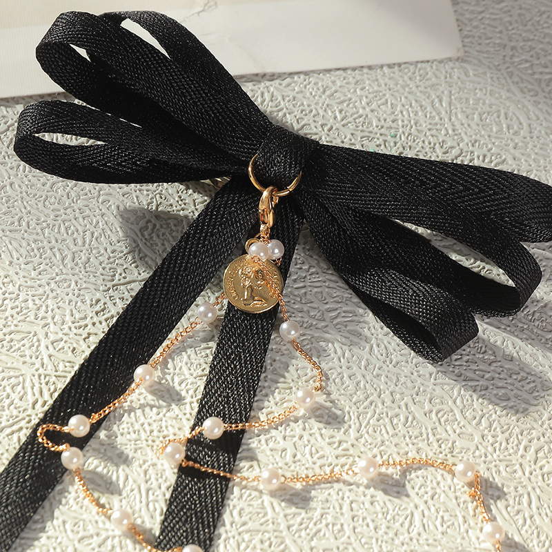 Einfache Neue Mode Perlenkette Bogen Haarnadel display picture 6