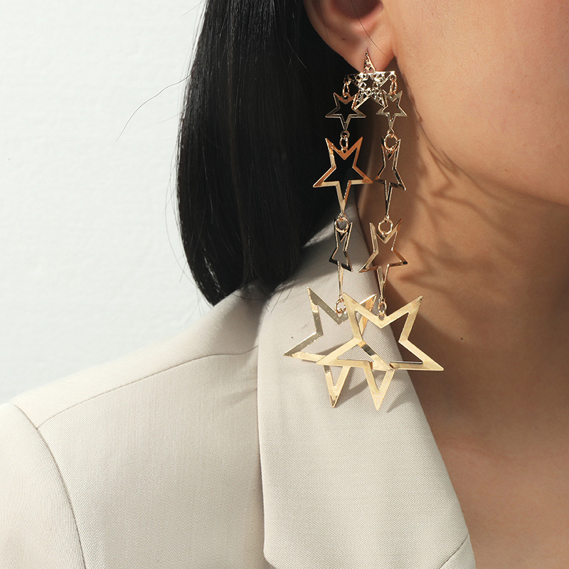 Fashion Hollow Five-pointed Star Long Tassel Earrings display picture 1