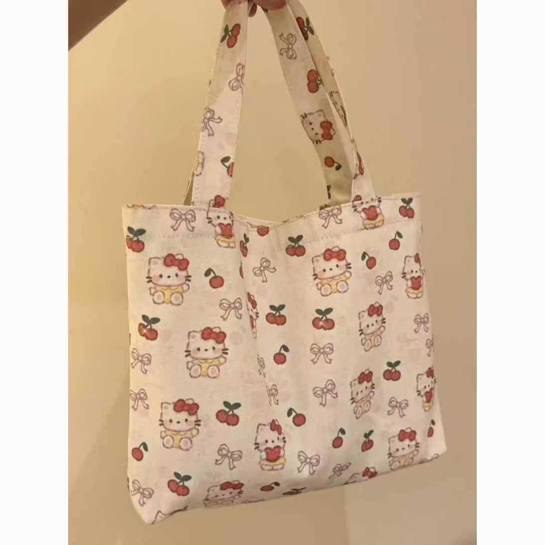 kitty印花帆布包女2025高颜值春夏新款可爱通勤单肩包简约手提包