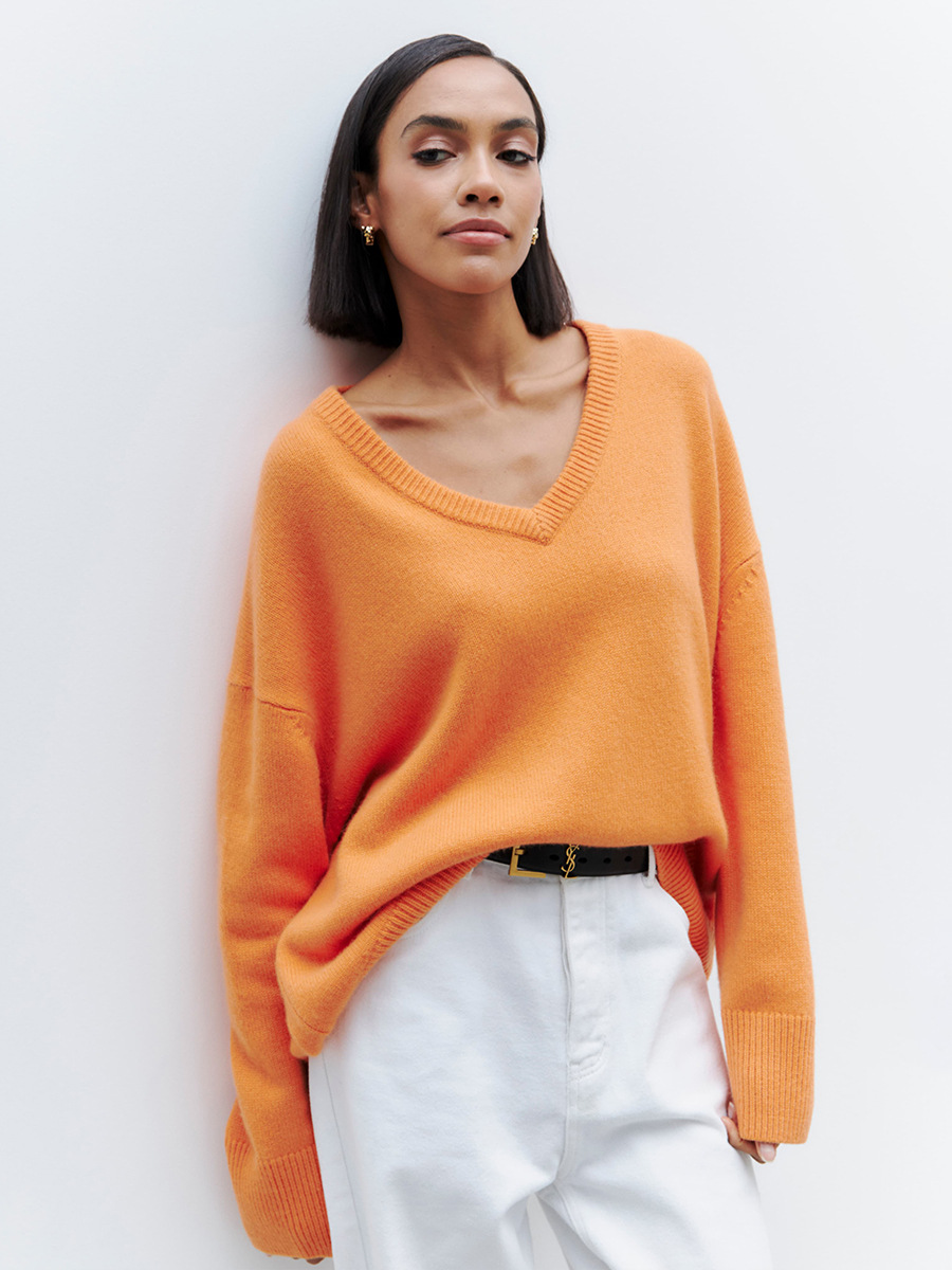 Suéter transfronterizo con cuello en V para mujer 2025 otoño e invierno Suéter de todo fósforo de color sólido europeo y americano Suéter de punto suelto de Amazon image 1