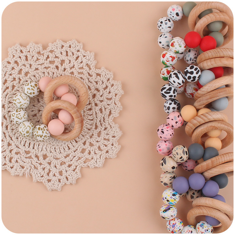 Nuevo bebé suministros de silicona leopardo cuentas mordedor pulsera calmante bebé DIY mordedura de silicona juguete de haya
