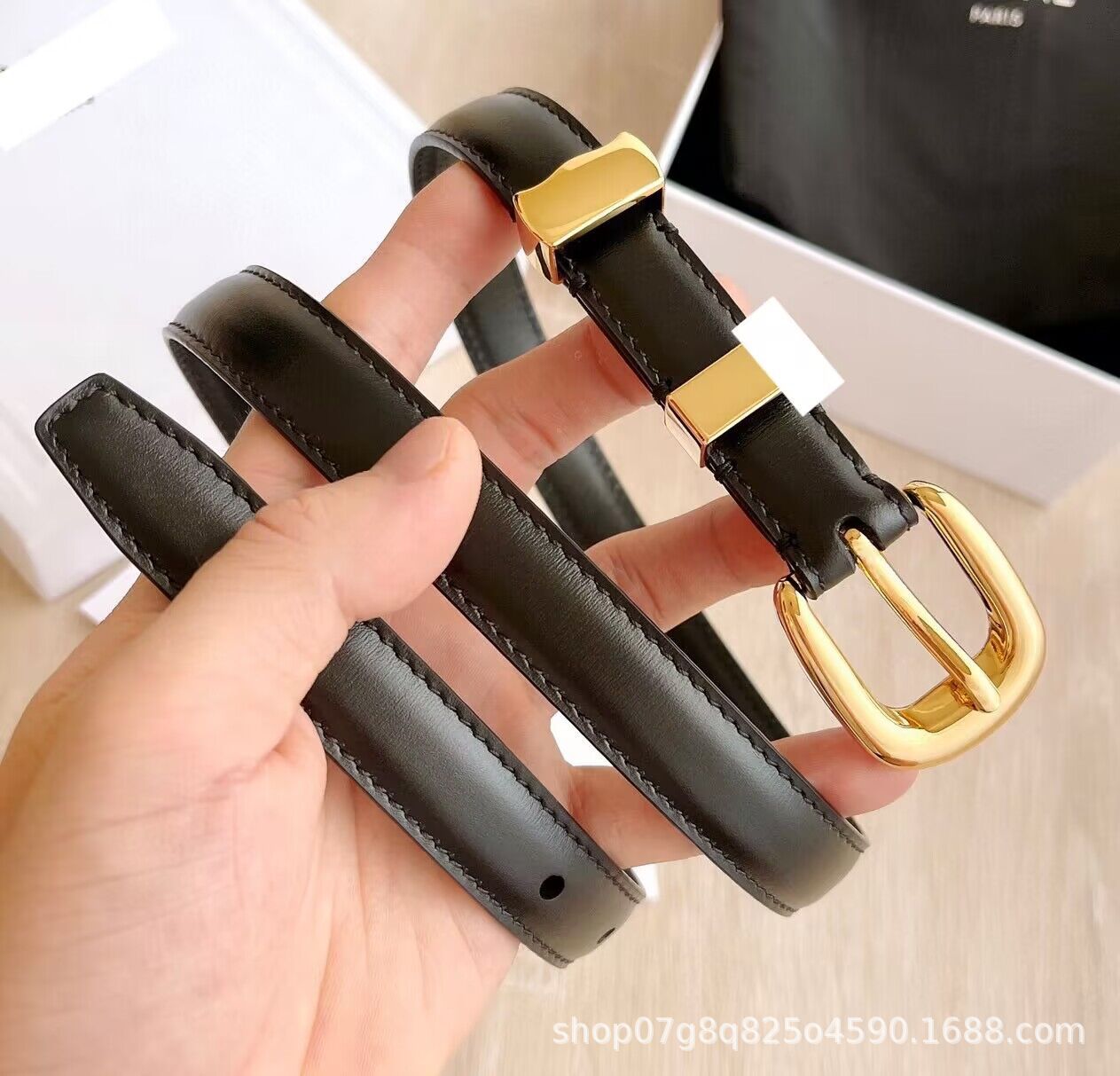 Black gold buckle