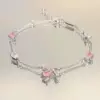 Fuchsia bracelet with zircon with bow