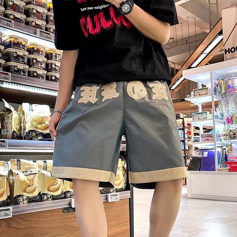 Marca de moda callejera europea y americana 2024 primavera y verano nuevo producto ligero camaleón contraste color bordado moda deportes casual pantalones cortos hombres