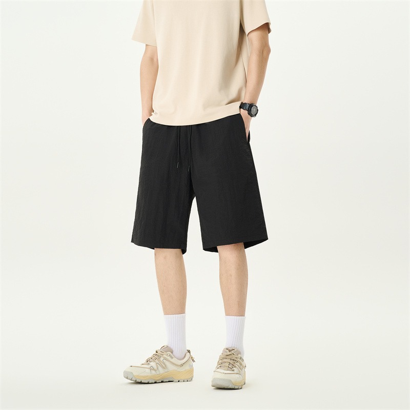 Camisas y menos ropa pantalones cortos casuales de verano seda de hielo para hombres, transpirable y de secado rápido, pantalones de cinco puntos sueltos para correr en deportes callejeros fritos