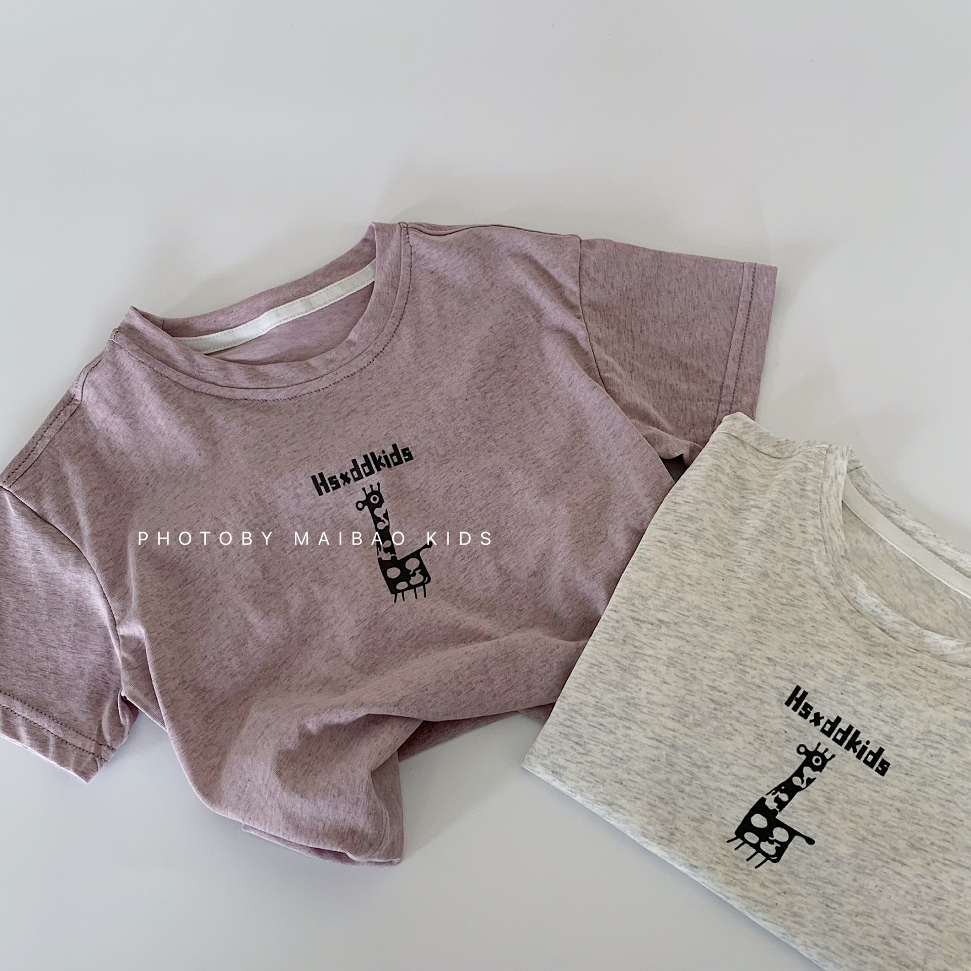 Camiseta para niños Maibao 2025 verano nuevo estilo coreano niños y niñas dibujos animados suéter de manga corta bebé verano al por mayor a