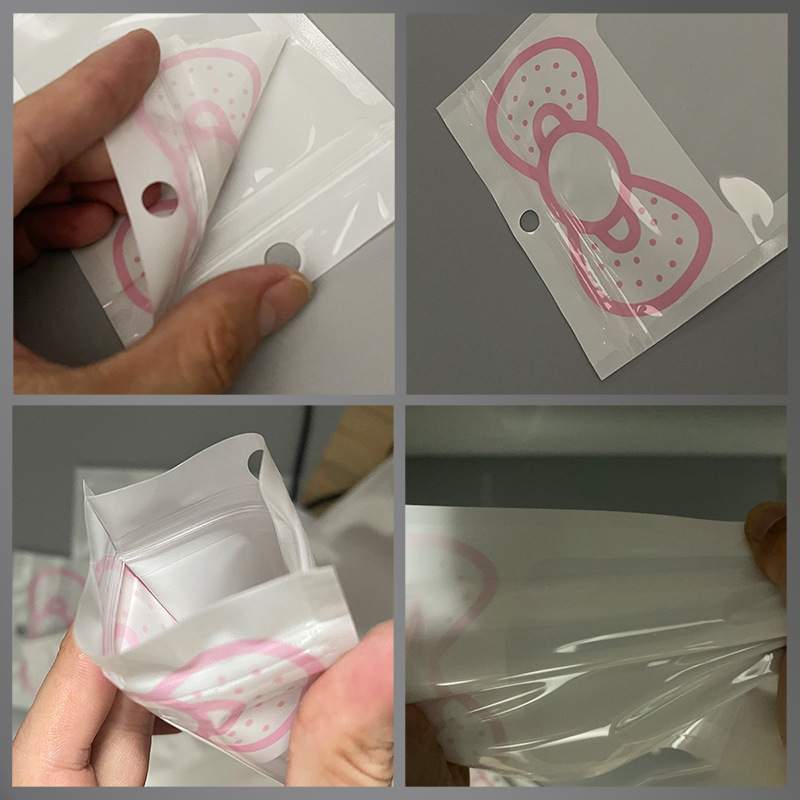蝶結びの漫画の首飾りのネックレスは袋のデータ線の携帯電話の携帯電話の箱から骨の袋のイヤリングを包装して酸化防止の密封を密封します。|undefined