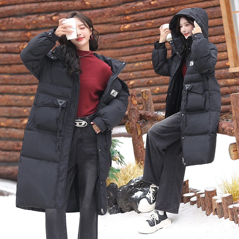 2025 invierno nuevo largo estilo coreano suelto chaqueta de pluma de algodón para mujeres laca engrosada chaqueta de algodón con capuz