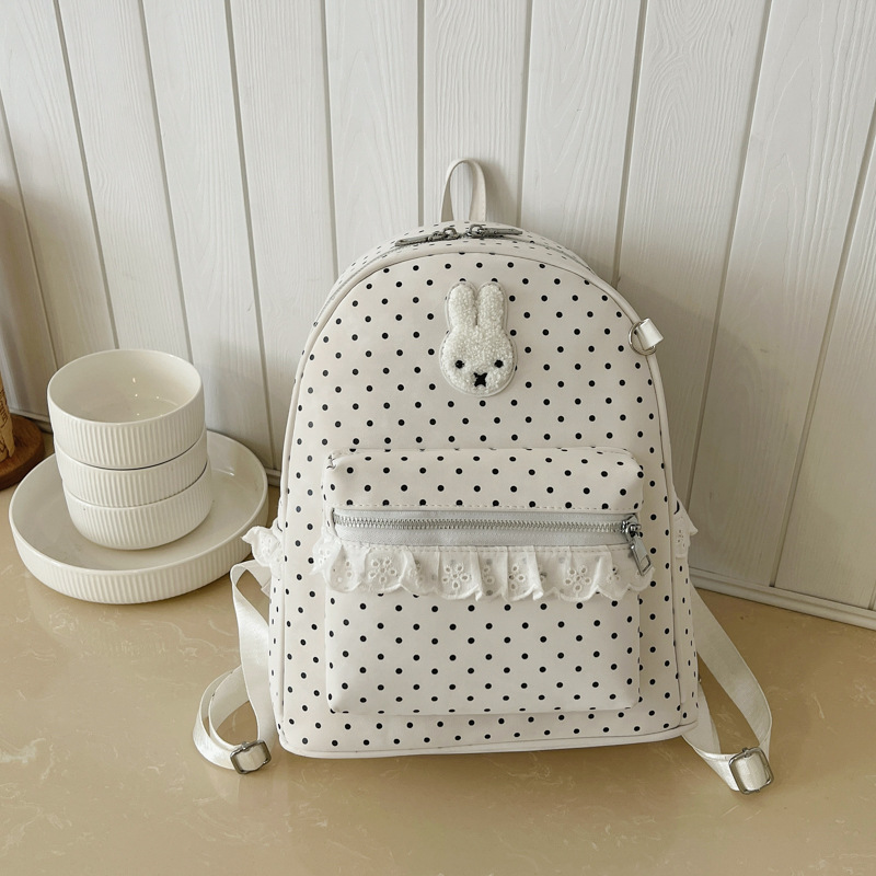 Nuevo estilo coreano dulce simple mochila pequeña mochila de conejo punto ondulado lindo mochila de alto valor de la cara fuera de la mochila de estudiantes de viaje
