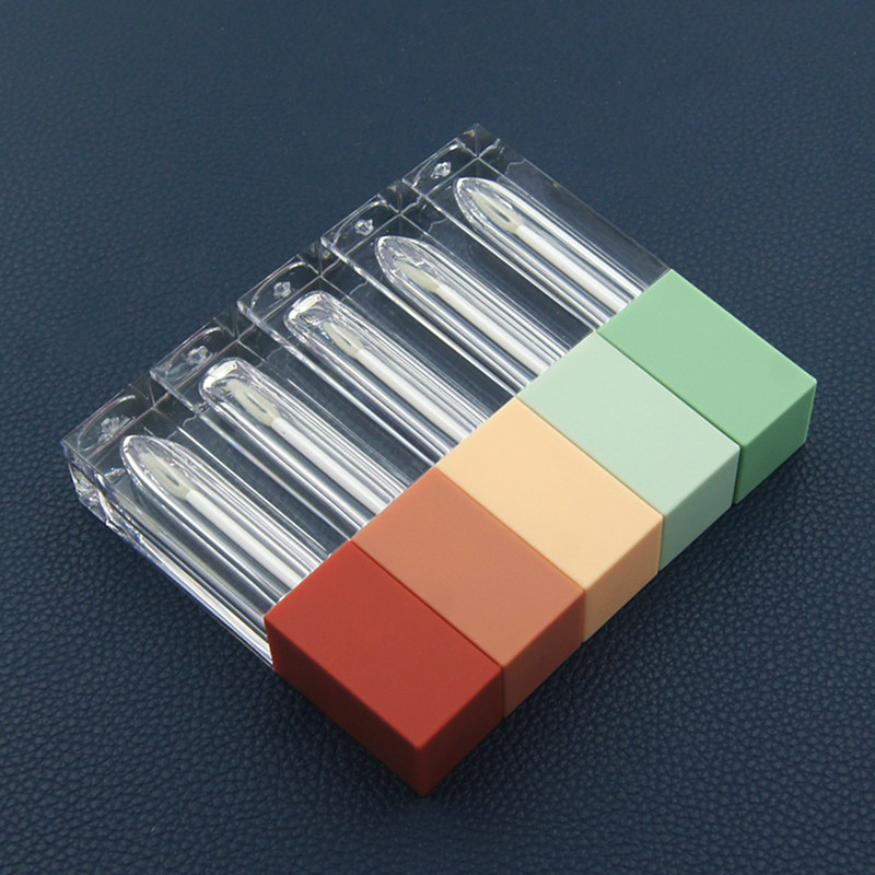 Fábrica en stock al por mayor multi-Cubierta esmerilada color botella transparente tubo de esmalte labial tubo de lápiz labial tubo vacío tubo cosmético logotipo impreso