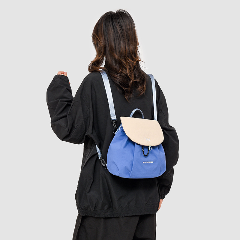 Hombres y mujeres mochila 2025 nueva mochila de estudiantes coreana de gran capacidad, mochila escolar de estilo universitario, mochila de viaje ocio