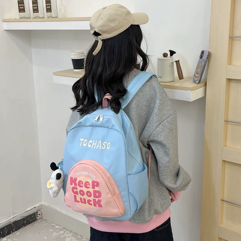 Big school bag with letters, capacious high quality backpack, simple and elegant design