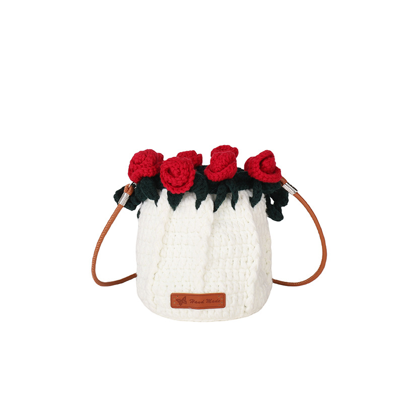 Bolso de cubo de diseño de nicho 2025 nuevo mini bolso femenino ramo de rosas bolso de hombro bolso de mensajero de punto de lana marea