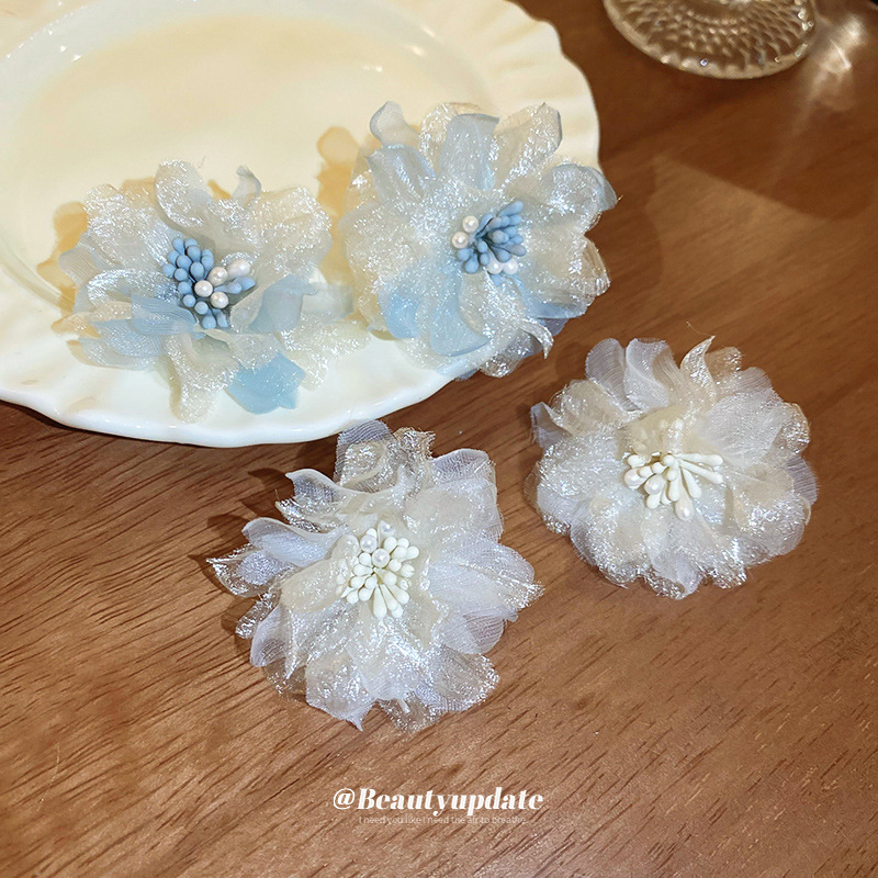 Pendientes de estambre de malla de flor de aguja de plata Pendientes coreanos pequeños frescos de alta gama Pendientes dulces de súper hadas de verano al por mayor