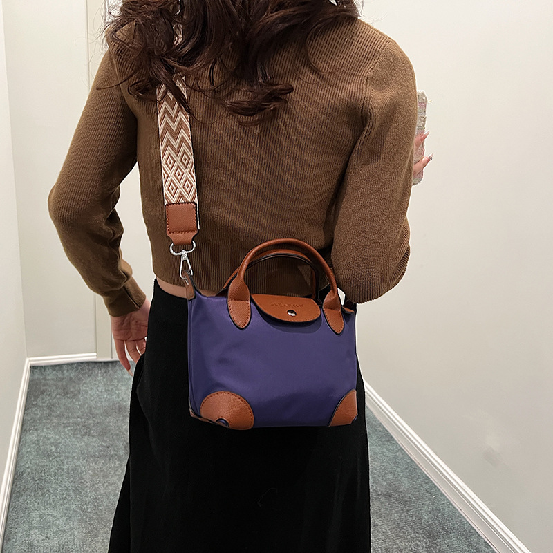 Mini bolso de bolsillo de mano pequeña mujer 2025 nuevo estilo transfronterizo de tela de nylon ligera de moda ocio de hombro bolsa inclinada