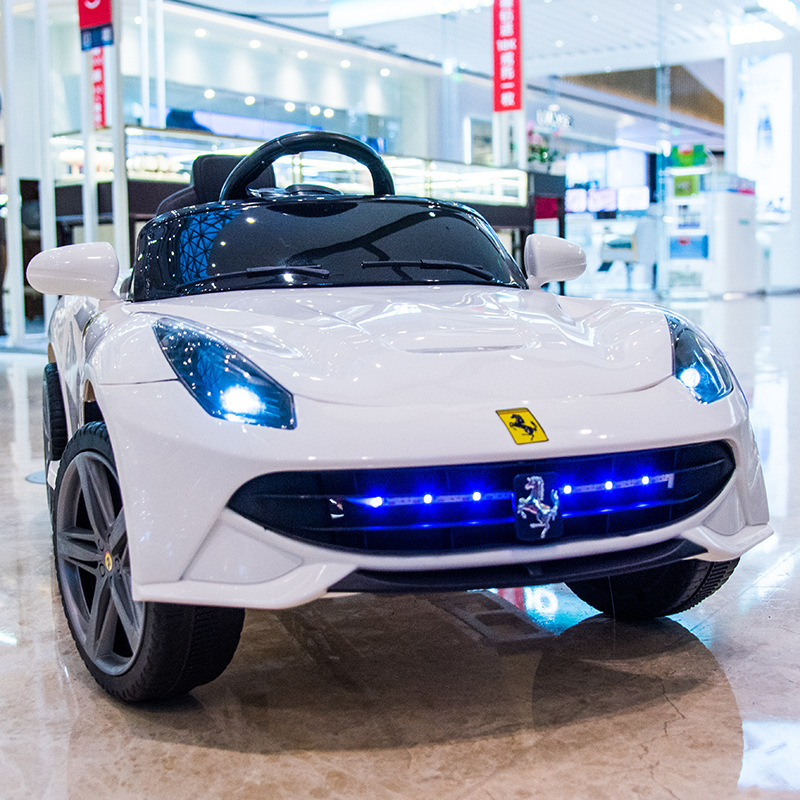 vehículo eléctrico transfronterizo para niños de cuatro ruedas de dos tracciones, coche de juguete de control remoto para hombres y mujeres, sonido Bluetooth