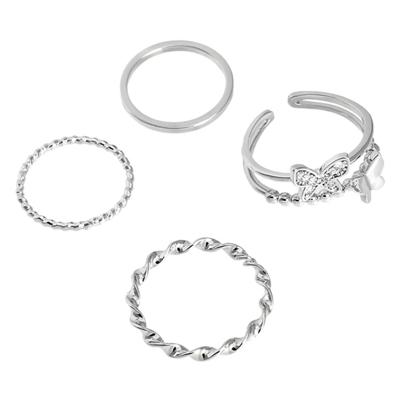 Exquisito Súper Hada Mariposa torcida anillo de cuatro piezas anillo femenino ligero nicho de lujo diseño sentido personalidad de la moda temperamento anillo índice