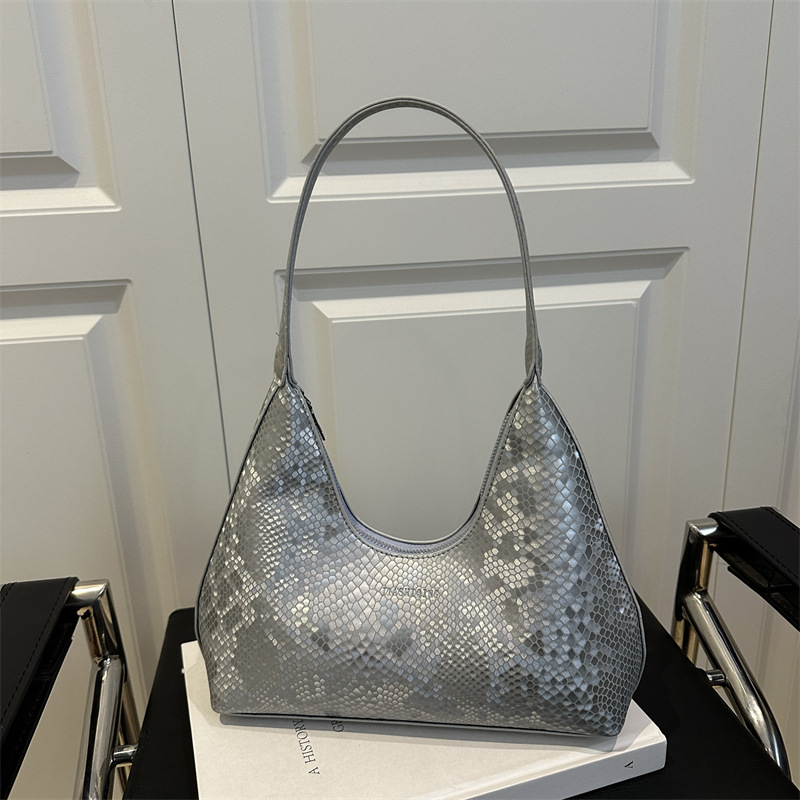 Bolsa de brazalete de hombro, primavera y verano de moda con patrón de serpiente, 2025 ocio, nuevo estilo coreano de textura simple, bolsa de tendencia de braza.