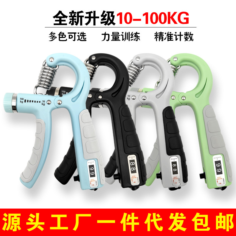 握力器は腕の男性の専門力のフィットネスの器材を練習します。|undefined