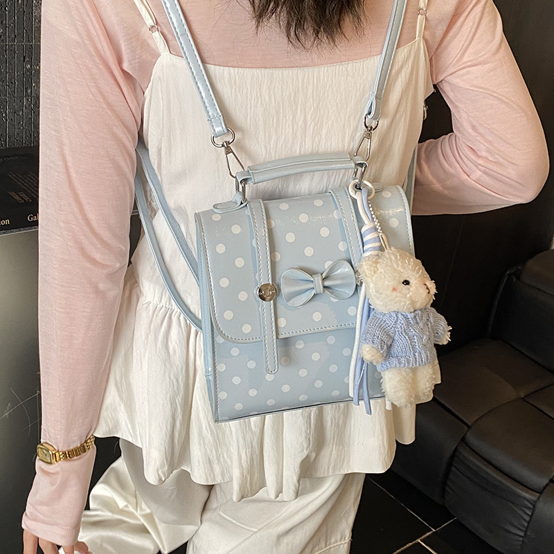 Cute arco ondulado punto PU mochila estilo universitario multifuncional mochila de hombro 2026 nueva mochila de mujer